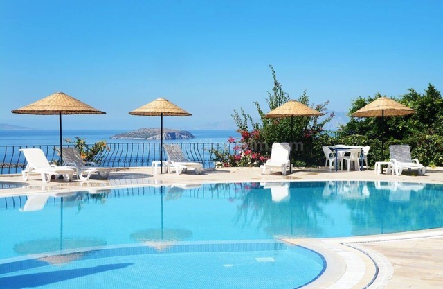 Karya apartment Gumusluk Bodrum with seaview and communal site pool.