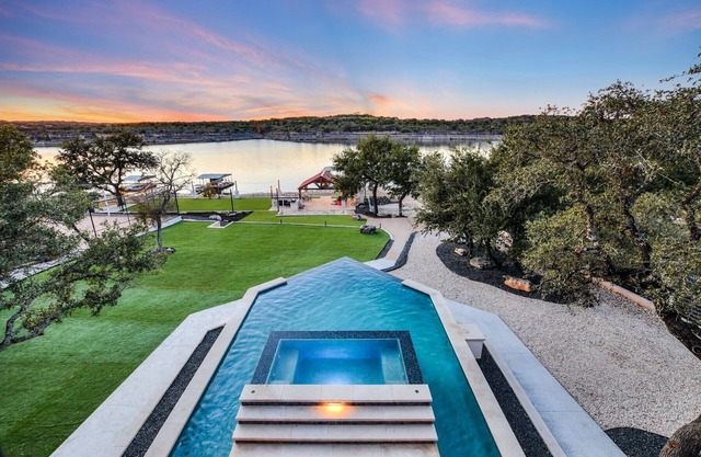 Lake Front Home with Pool, Dock, Views, Sports Court, & Beautiful Sunsets!