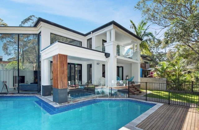 Lake house with pool and theatre room