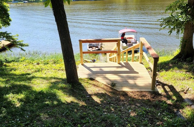 Lake shore home right on the water with private boat dock