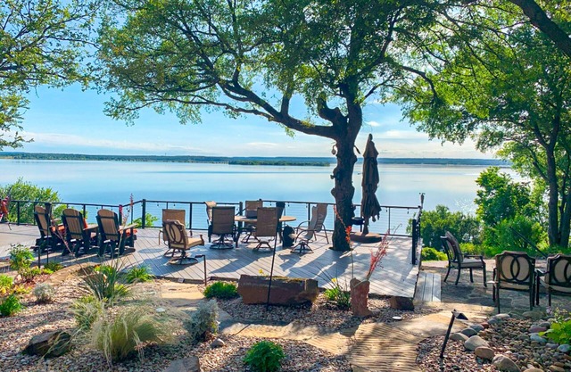 Lakefront estate with spectacular views, large deck, tiki bar, & private dock