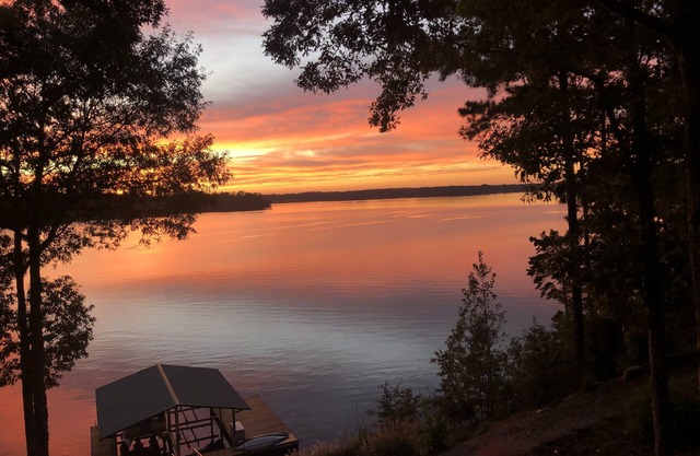 Lakefront Home with Amazing Sunsets, Private Dock & Firepit