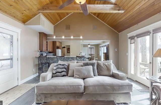 Lakefront house with great kitchen, fireplace, and deck.