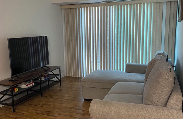 Large 2+2+den, private terrace, gym, sauna, garage, walk to subway!