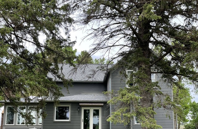 Large farmhouse with 80 acres of native prairie.