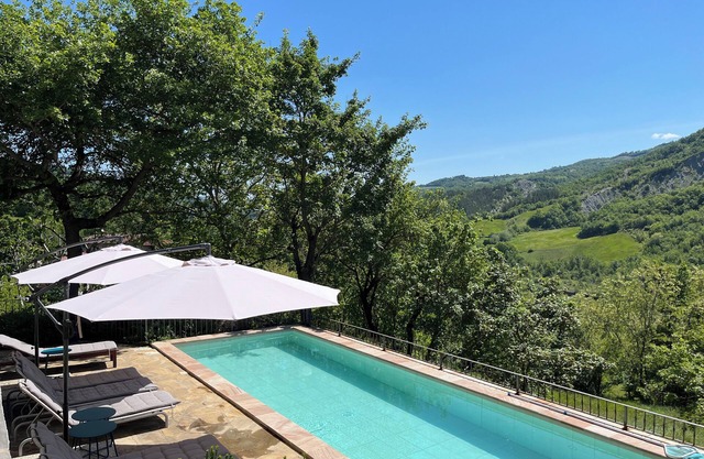 Large house with shared pool, sleeps up to 12, wonderful mountain setting