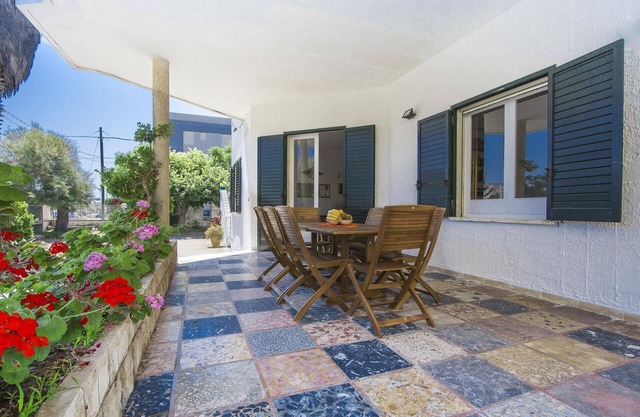Large villa with sea view and outdoor spaces 20m from the sandy beach of San Foca.
