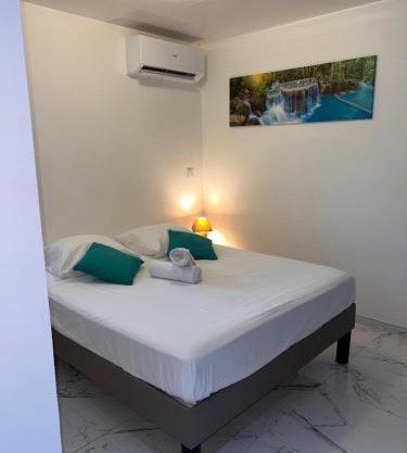 Le Nid Tropical - T2 Climatisé - Proche du centre