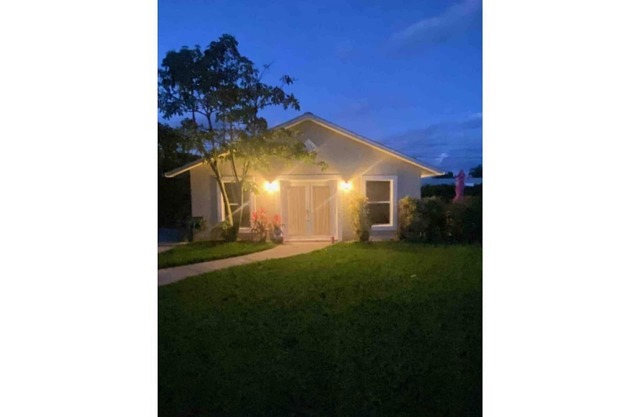Lilly Pulitzer inspired cottage in the beautiful beach town of Hobe Sound, FL.