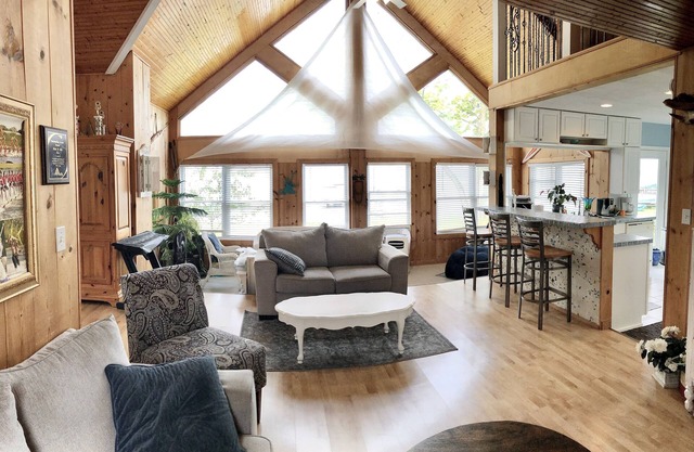 Little White Cottage on Chippewa Lake just steps to the waters edge.