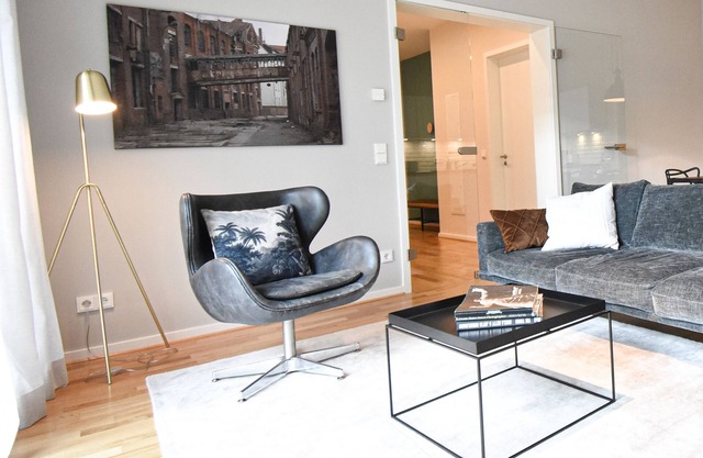 Living in the historic Bleichert plants in the middle of the green heart of the city.