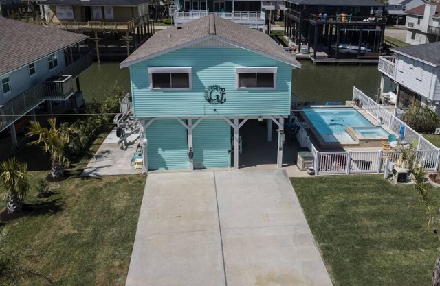 "Living the Dream"- Canal Bay home with Pool! -2 night minimum stay. No Pets