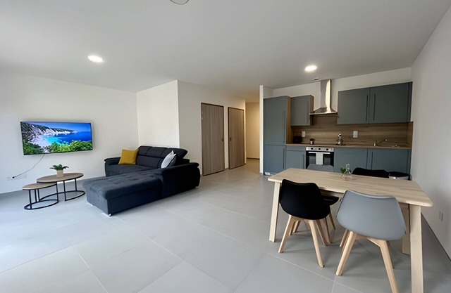 Logement Neuf en Rez-de-jardin Avec Parking à 20 min de Lyon