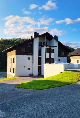 Loma-asunto Tahkon Alppitalossa