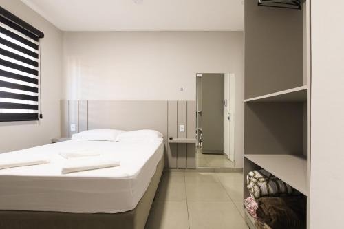 Lou Suítes - Suíte 13 - Simples, Confortável e Perfeito