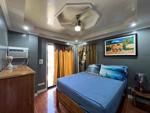 Lovely Bedroom in Lila, Bohol with WIFI, AC and Ref