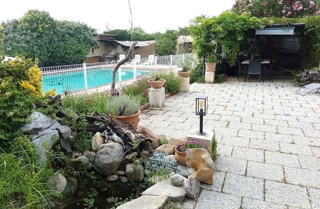 Lovely spacious one level gîte with shady terraces, pool, billiard/music room