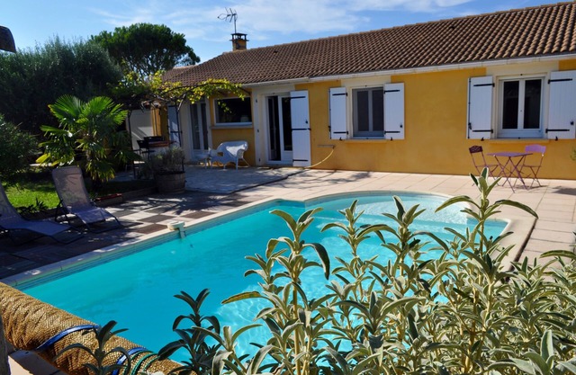 Lovely house with landscaped garden and private pool.