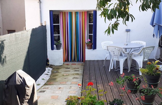 Lovely self contained three bedroom house with private garden.