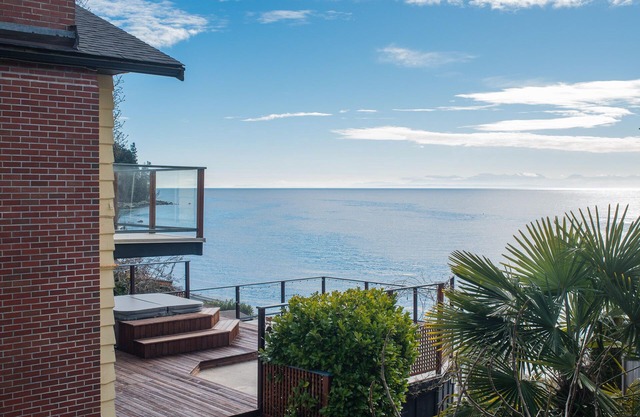 Lovely Waterfront Beach Haven with Hot Tub & SUP