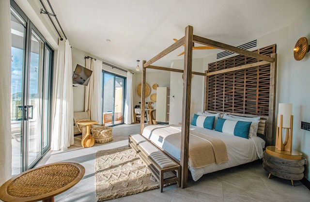 Luxe 2 Bedroom Retreat Overlooking Blue Waters with Direct Beach Access