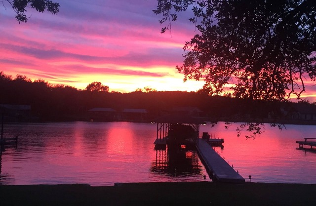 Luxury apartment is minutes from downtown. Lake and dock are on the property.