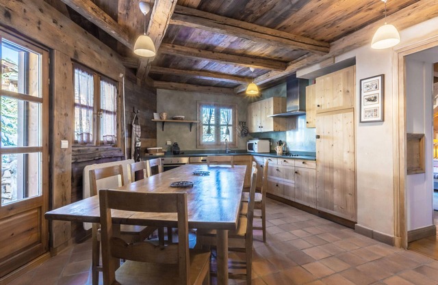 Luxury Chalet for 10 with Ski-In/Ski-Out Access, Fireplace, and Private Garage in Courchevel Village
