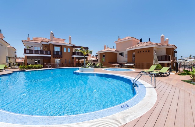 Luxury flat 5 minutes walk to the beach with heated and sea water pool