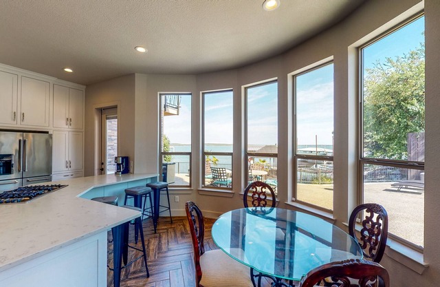 Luxury Lake Home with Stunning Water Views, Private Hot Tub & Gourmet Kitchen
