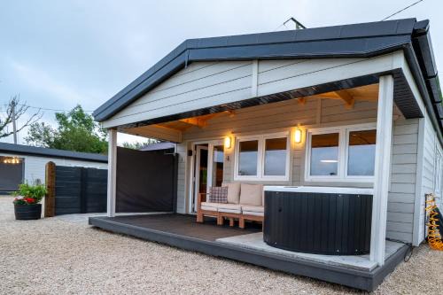 Luxury Log Cabin with Private Hot Tub & Sea Views