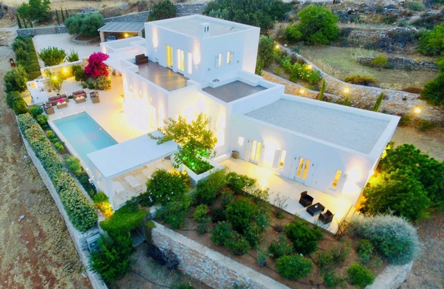 Luxury villa with pool in the middle of an olive grove and dream view of the sea