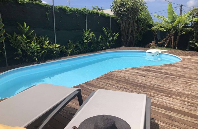 MANGO LODGE - Comfortable single storey apartment with swimming pool access