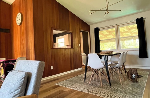 Mid Century Miller Beach House near Indiana Dunes with game room and fire pit.