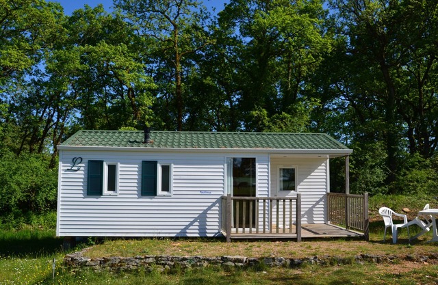 Mobile home on a farm with swimming pool