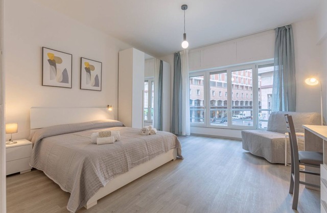 Modern 96 sqm apartment, perfect for 5 people, located on the first floor of a building with lift (twenty steps to access it). The accommodation is located in a strategic position, just a 4-minute walk from the Parco 11 Settembre 2001 and a 6-minute walk