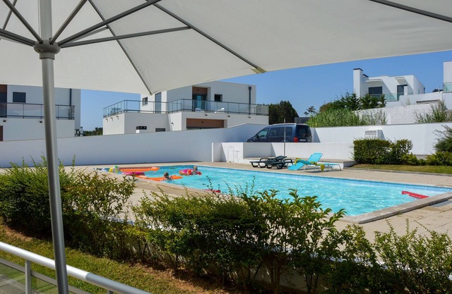 Modern, air-conditioned family apartment with pool. 10 minute walk to beach