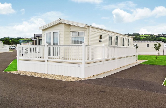 Modern and contemporary 12ft wide caravan with one double and one twin.