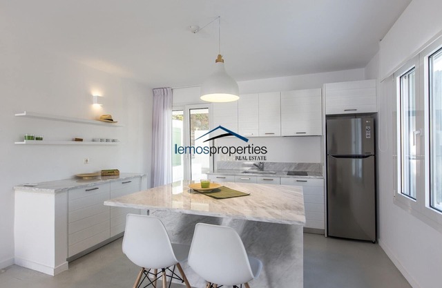 Modern apartment with a sea view and swimming pool