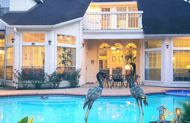 Modern Custom Home in Prestigious Champions Golf Club Community