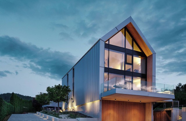 Modern design and lots of glass meet forests, meadows, mountains and lakes!