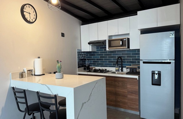 Modern double-height loft new and equipped with its own parking lot