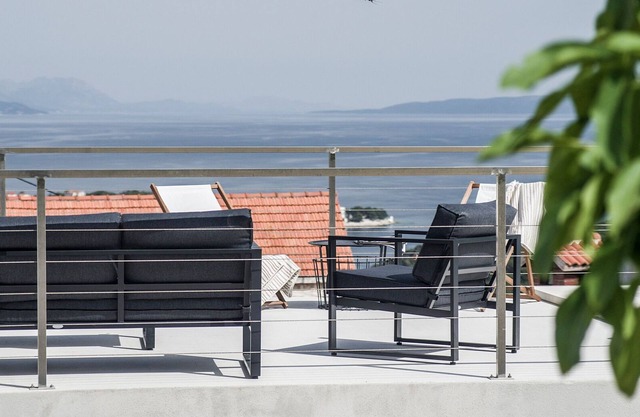 Modern eclectic design, pool with a sea view