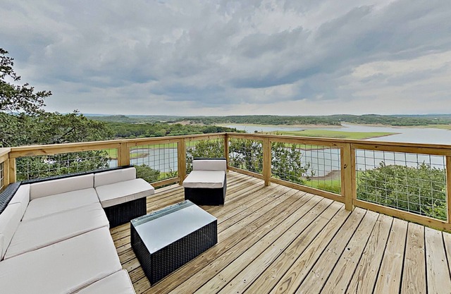 Modern luxury home with three lake-view decks - pools & tennis