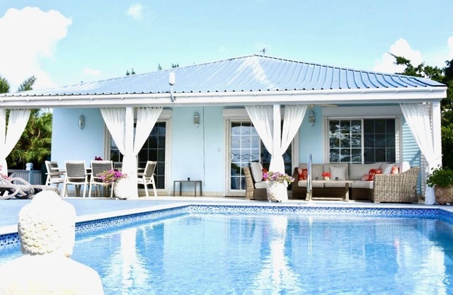 Modern & Stylish 4 Bedroomed Villa, private pool, walking distance to beach.