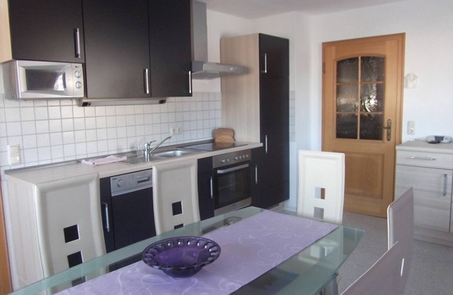 Modern vacation apartment for 6 people with balcony in a quiet location