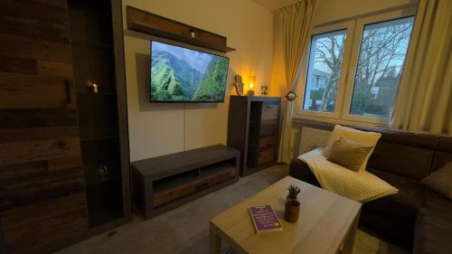 Moderne Wohnung mit Waldflair und Kaffeegenuss