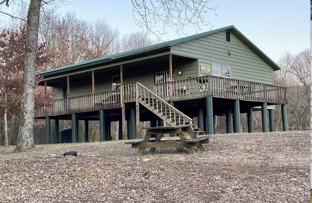 Mulberry River front cabin near ATV/OHV trailheads at Cass, Arkansas. Save 10% each day when booking 5 days or more.