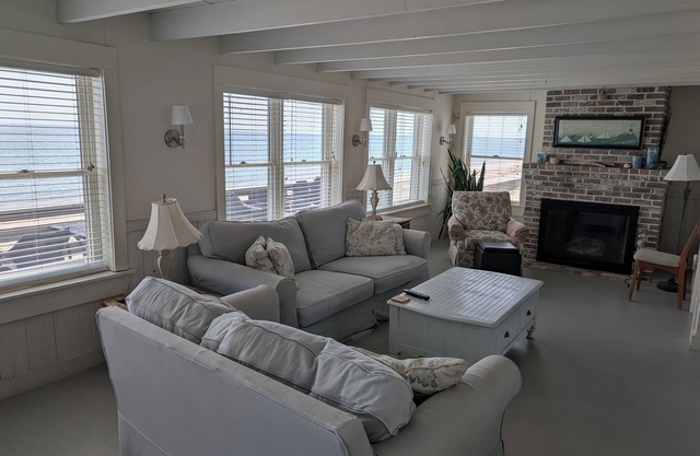 Nantucket Style oceanfront home directly on a sandy beach