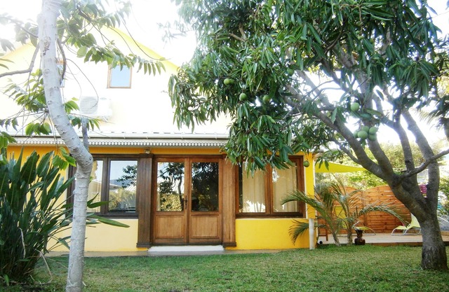 nearest beach, Villa colors turned to her garden and swimming pool