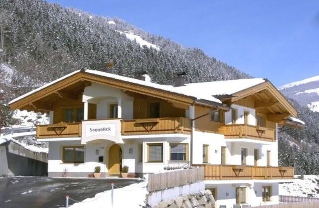 new built cottage on a sunny hill